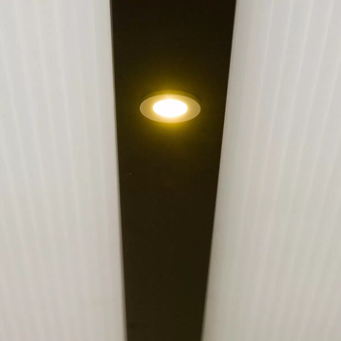 Light fixture on a white ceiling