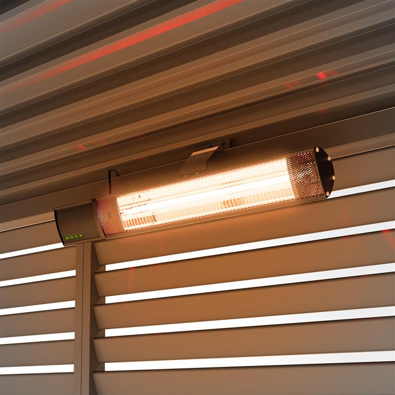 Nova Hestia 2kW infrared heater mounted under a pergola roof, element glowing at dusk