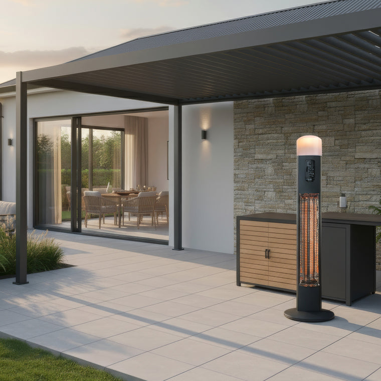 Nova Diana pedestal heater beside an outdoor kitchen unit, lamp and element lit