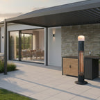 Nova Diana pedestal heater beside an outdoor kitchen unit, lamp and element lit