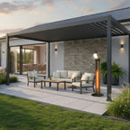 Nova Apollo pedestal heater on a patio beneath a pergola, LED head lit at dusk