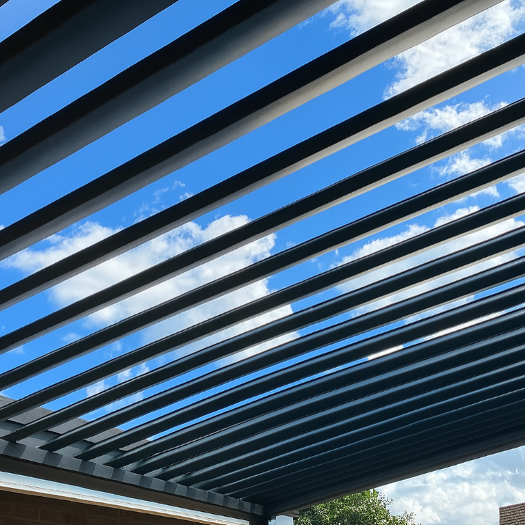 Adjustable louvered roof