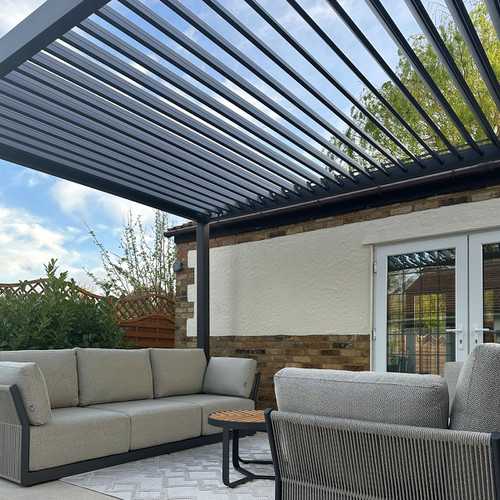 Adjustable louvered roof