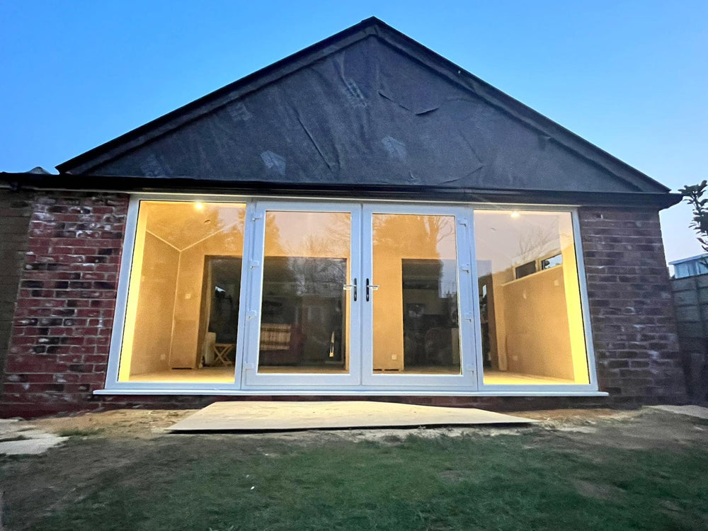 Finished glazed gable at dusk