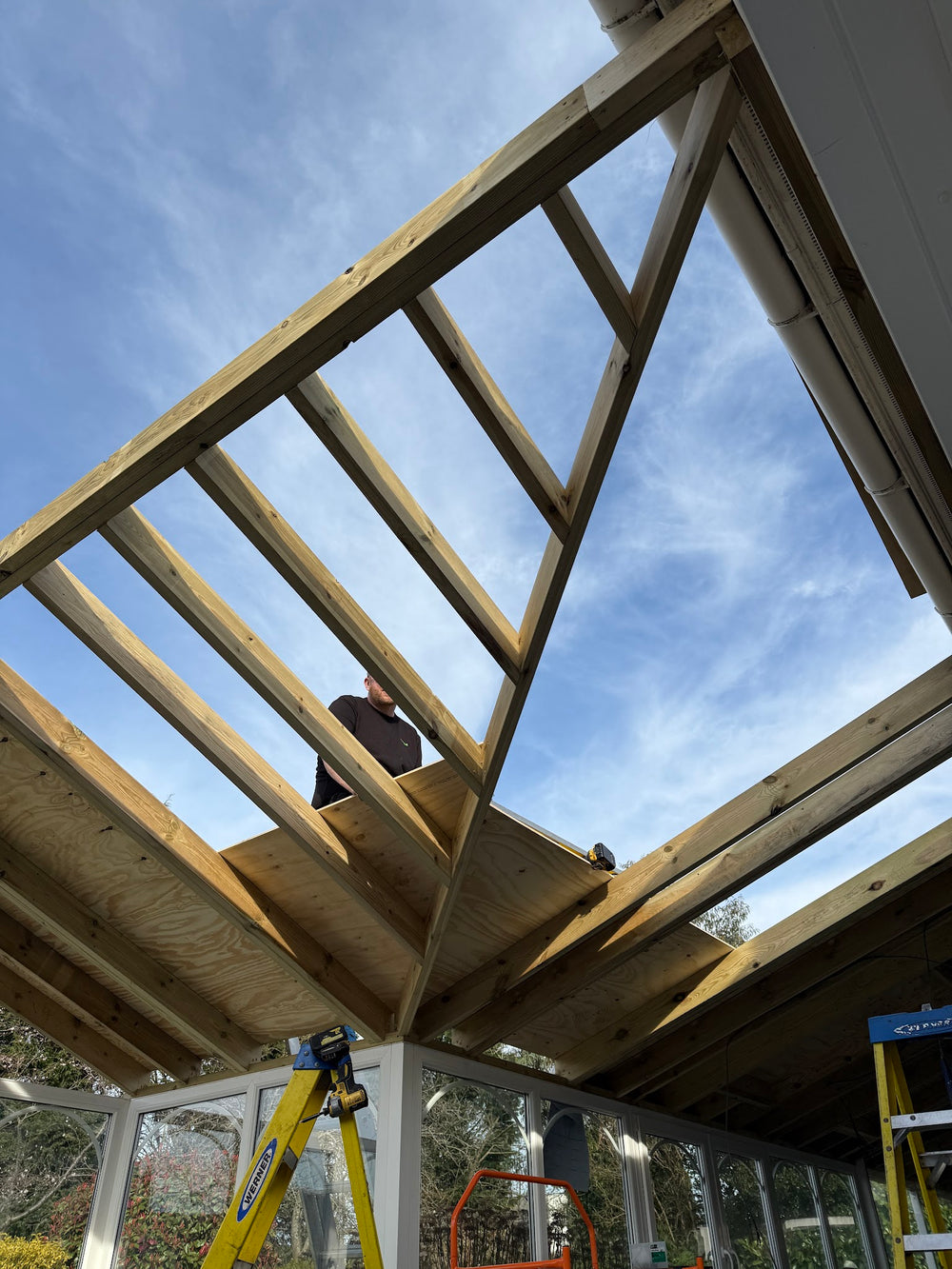 Timber roof structure going up