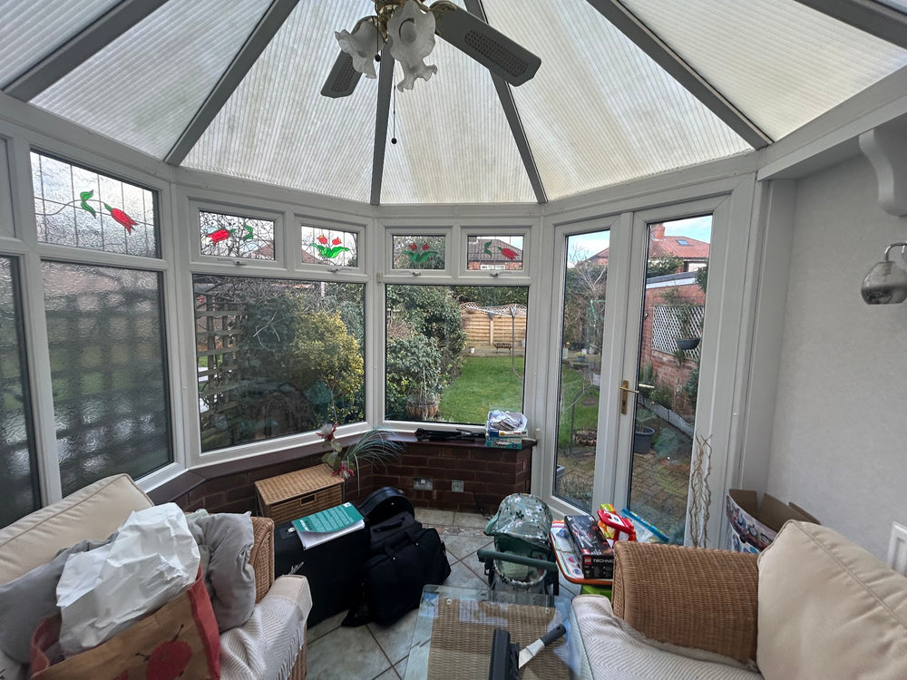 Before, polycarbonate roof and ceiling fan