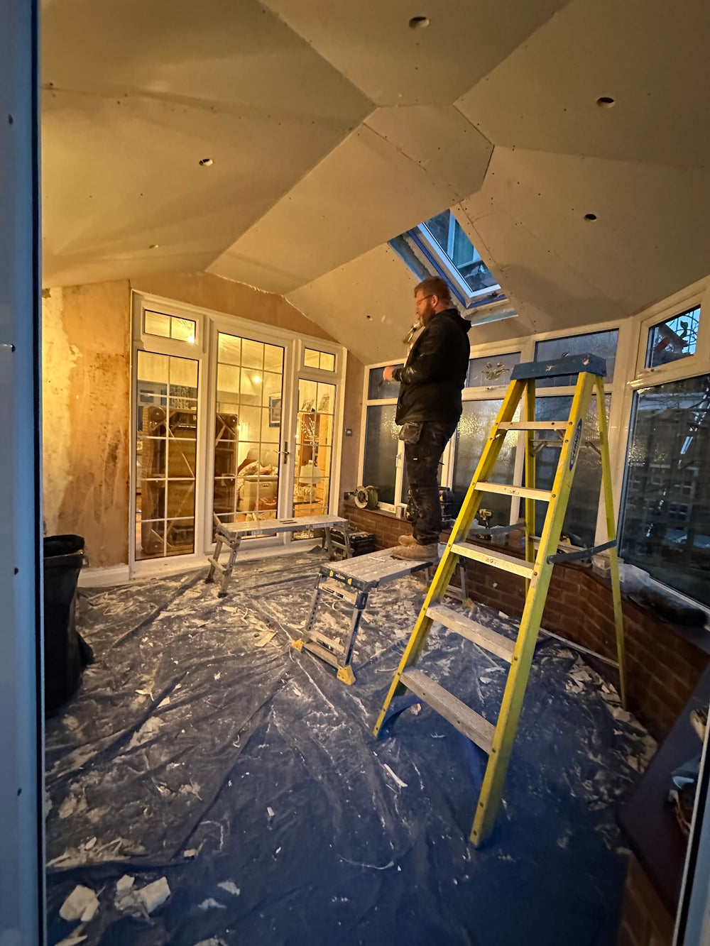 Plastering the new ceiling